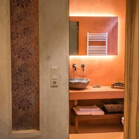 «σκλάβας χνάρι» παραδοσιακός ξενώνας Apartmán Magouliana